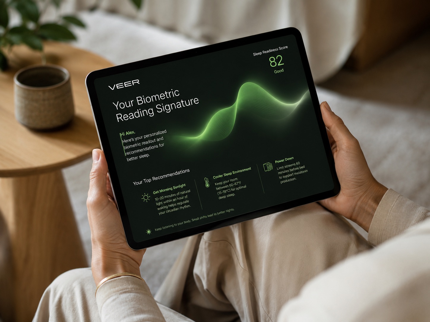 Guest holding iPad showing their biometric reading signature